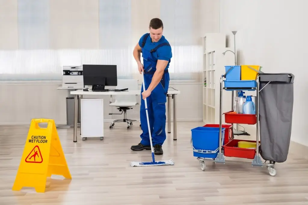 cleaner cleaning the office