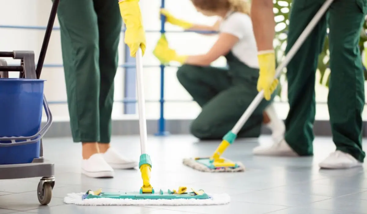 Commercial and office cleaners mopping the floor