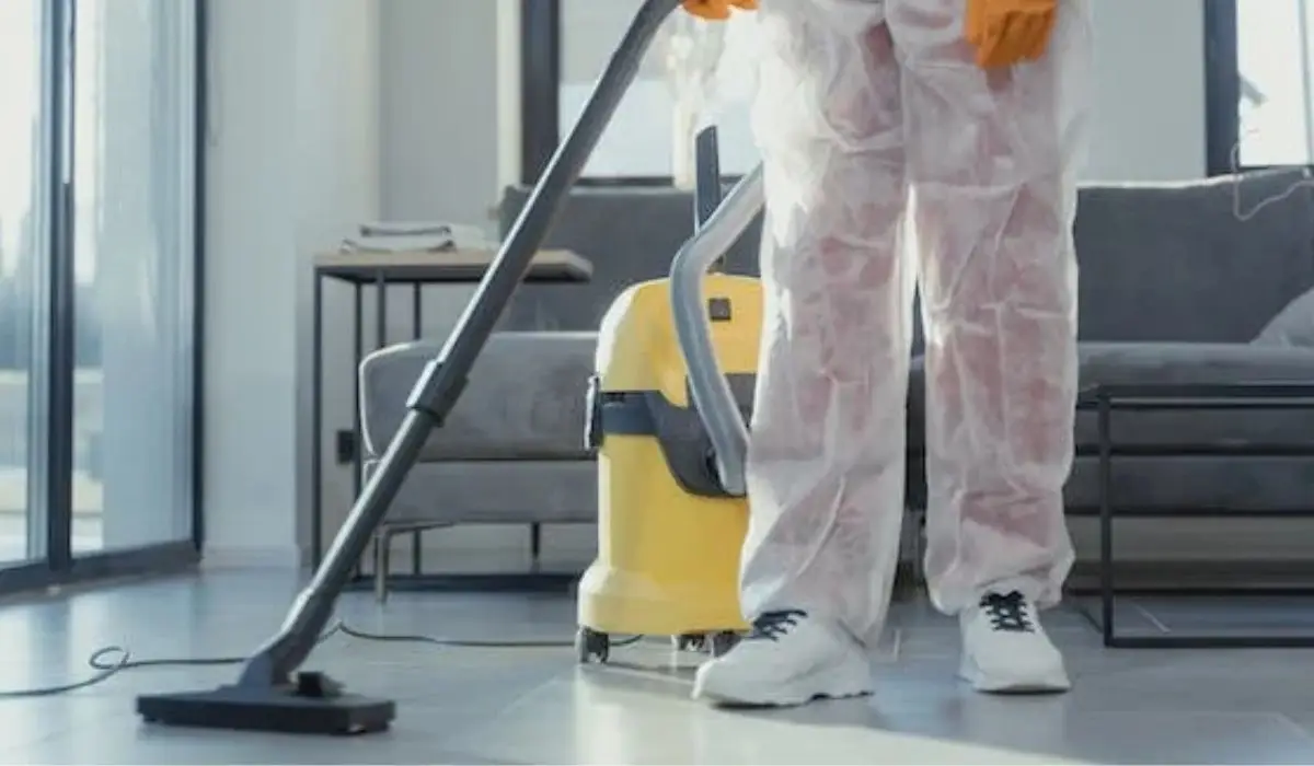 a-close-up-shot-of-a-person-using-a-vacuum-cleaner